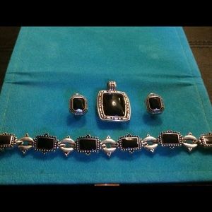 Black and silver bracelet pendant and ears